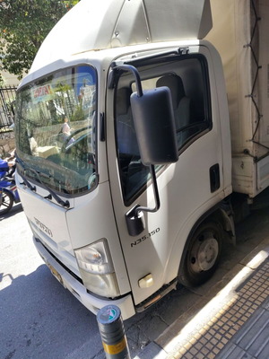 Isuzu Truck 2012 used, open cargo bed, reliable work vehicle