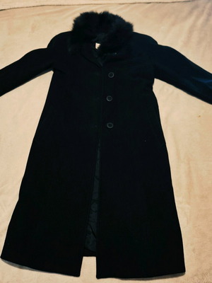 Black coat used with fur collar and shoulder pads