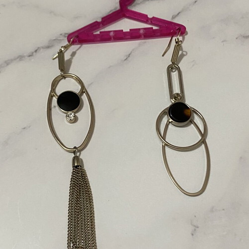 Long earrings used, black and silver color
