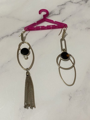 Long earrings used, black and silver color