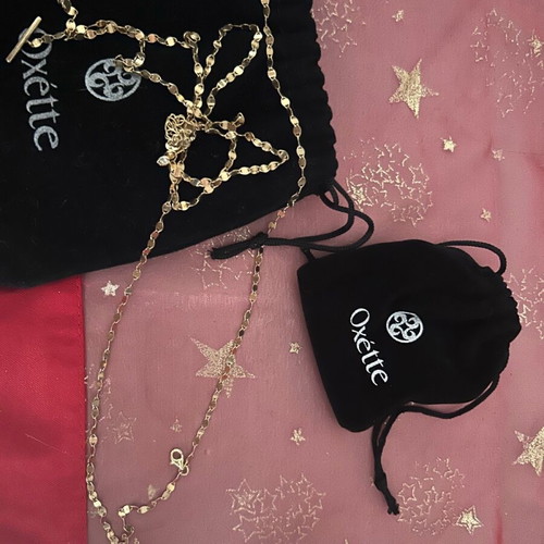 Oxette jewelry set like new, gold necklace and earrings