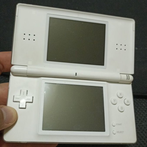 Nintendo DS Lite used, excellent condition with box, stylus, and charger