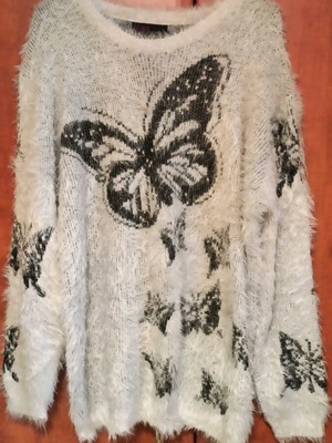 Women's blouse like new, black and white, sizes M and L