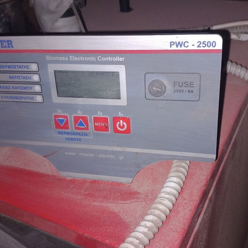 Pellet burner with chimney and 40 bags of pellet like new