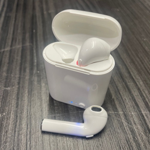 Wireless earbuds white used with charging case