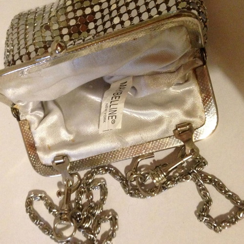 Maybelline New York hand bag used, silver evening