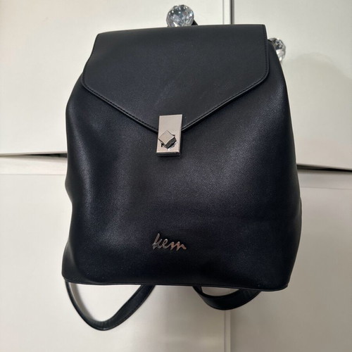 KEM black backpack bag like new with minor scratches on clasp
