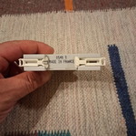 Legrand rail-mounted button switch with indicator light