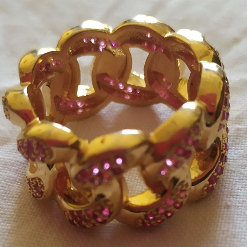 Ring with pink stones new, gold color