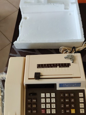 Vintage tabletop telephone with calculator and directory, new