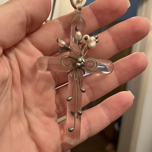 Decorative cross used with silver and pearls