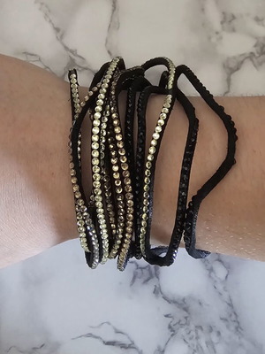 Black suede bracelet with black and beige stones