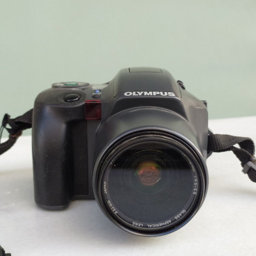 Olympus is100 35mm film camera used with 28-110mm autofocus lens