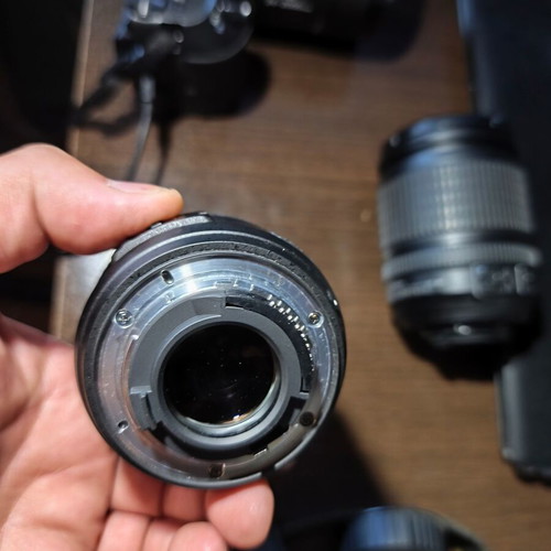 Nikon D5200 DSLR with Nikkor 35mm f/1.8G lens and accessories