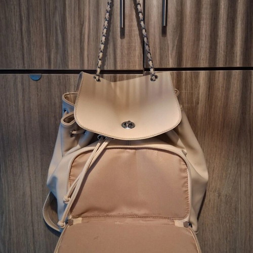 Backpack bag like new, beige faux leather with chain and straps