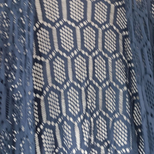 Blue summer bolero used with natural signs of wear