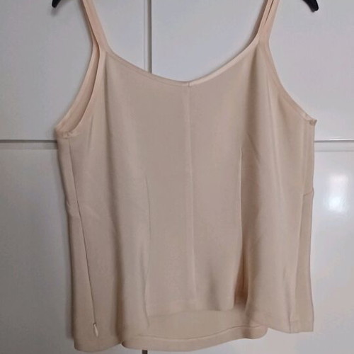 Sleeveless blouse with satin detail and side zipper, size small like new