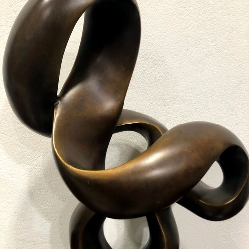 Modern sculpture used on black base, height 62cm