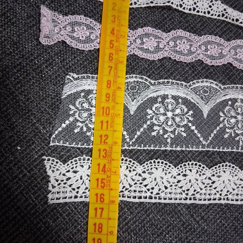 Machine lace set like new, mixed lengths and colors
