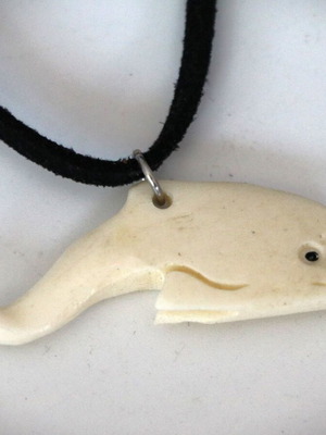 Handmade tribal dolphin pendant carved bone with leather cord