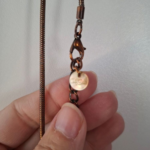 Necklace with thin metal chain and 3 pendants like new, gray-beige