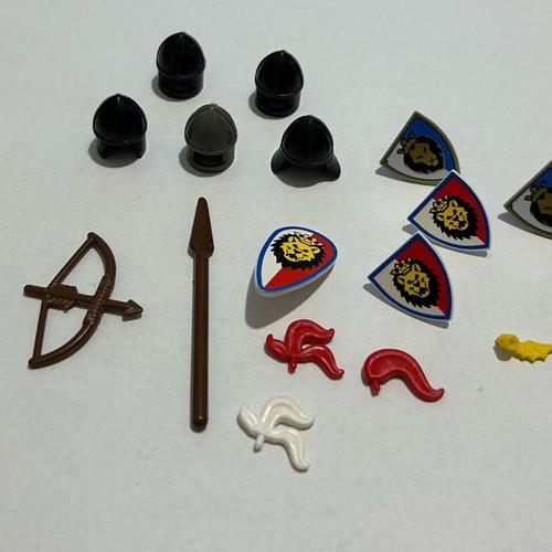 Lego Knights accessories pack used with wear on two helmets
