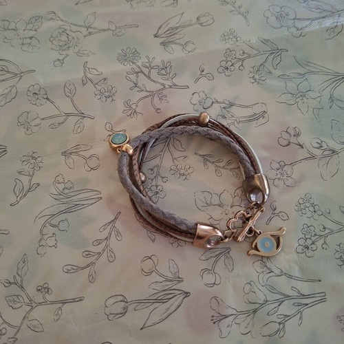 Boho multi-strand bracelet with crystal and evil eye charm