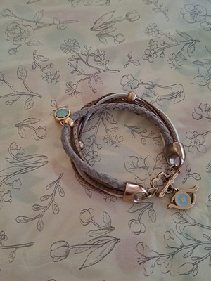 Boho multi-strand bracelet with crystal and evil eye charm