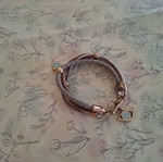 Boho multi-strand bracelet with crystal and evil eye charm