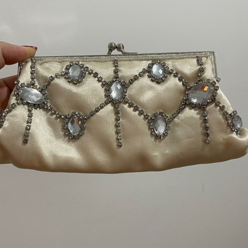 Clutch golden like new with long straps