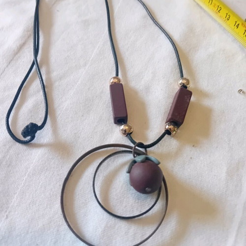 Necklace long handmade on black cord like new