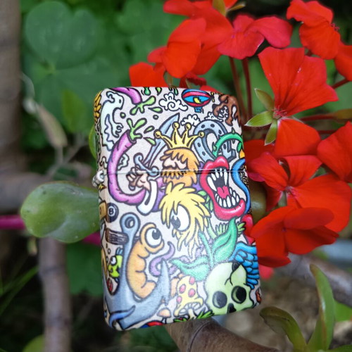 Zippo Crazy Collage Design lighter used with colorful 540 Color print