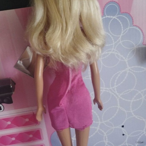 Barbie doll with 2012 Budget Heart Dress Glitz Barbie outfit