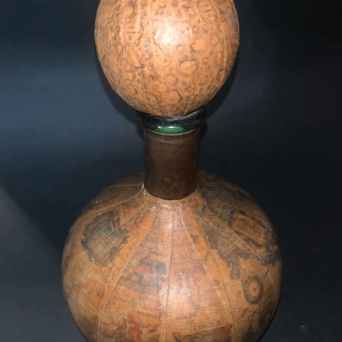 Vintage wine bottle used with Old World map design