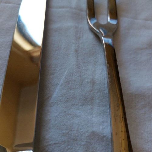 Meat serving knife and fork used, silver-plated with porcelain handles from England