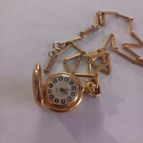 Winding necklace watch with chain like new