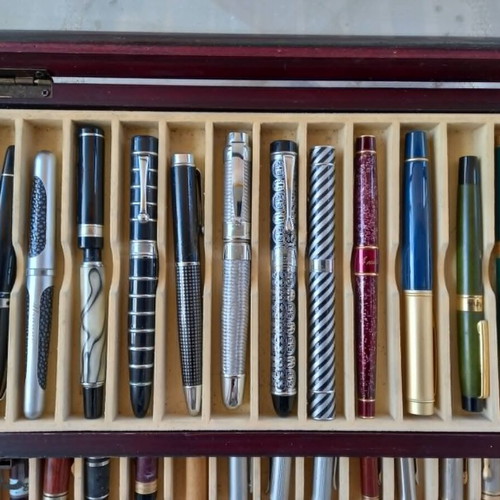 Collectible pens set of 36 with wooden case like new