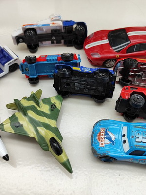 Toy cars and 2 toy airplanes, good condition with minor wear