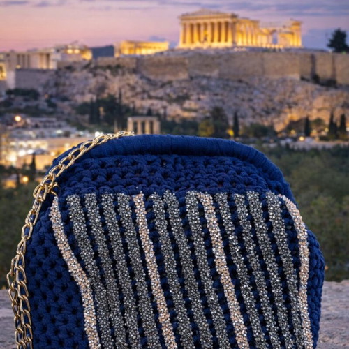 Handmade evening blue knitted shoulder bag with sparkle and chain