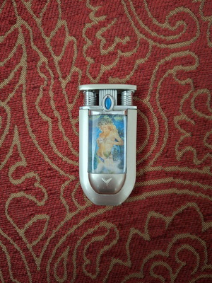 Vintage lighter with lenticular image like new, silver metal