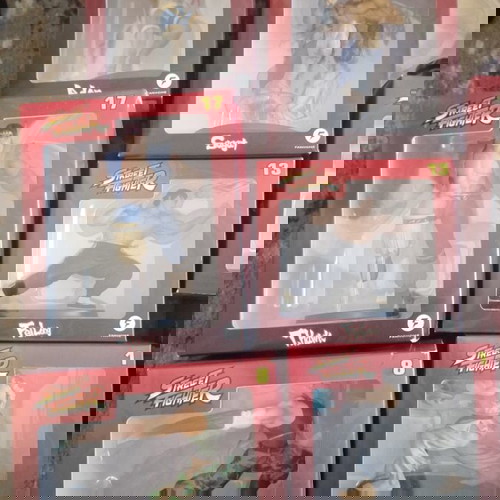 Street Fighter collection with 22 sealed figures and magazines, new