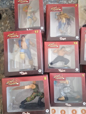 Street Fighter collection with 22 sealed figures and magazines, new