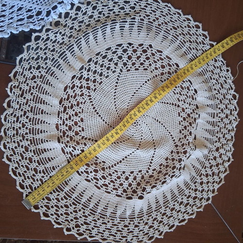Round handmade doilies used, set of 4, white and beige