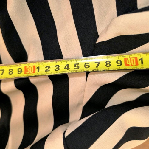 Women's shirt used with vertical stripes in beige and black