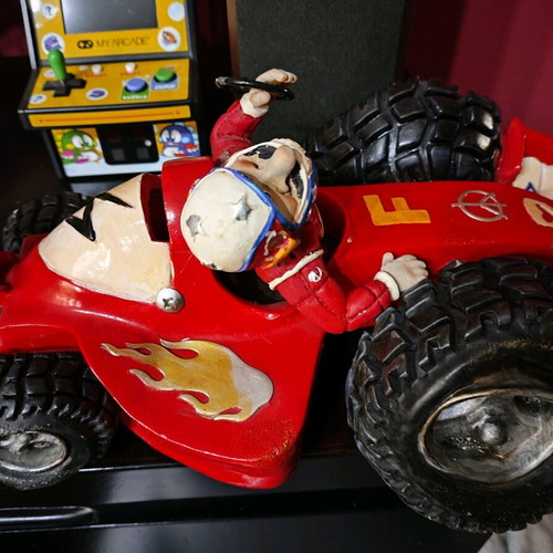 Cartoon piggy bank Formula 1 used