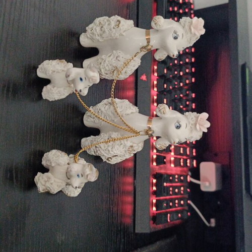 Porcelain poodle figures like new, mother, father and puppies