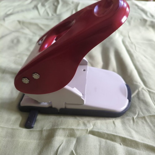 Leitz 5138 heavy duty hole puncher, red handle