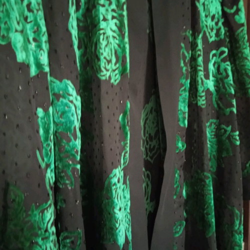Women's tunic like new, black with green flowers