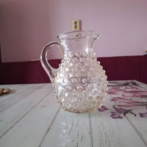 Vintage wine pitcher with bumps like new