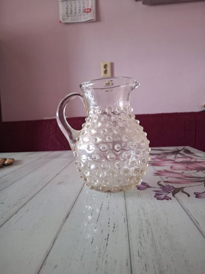 Vintage wine pitcher with bumps like new